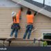 Construction Workers Installing Vinyl Siding Facade Stock Photo ...
